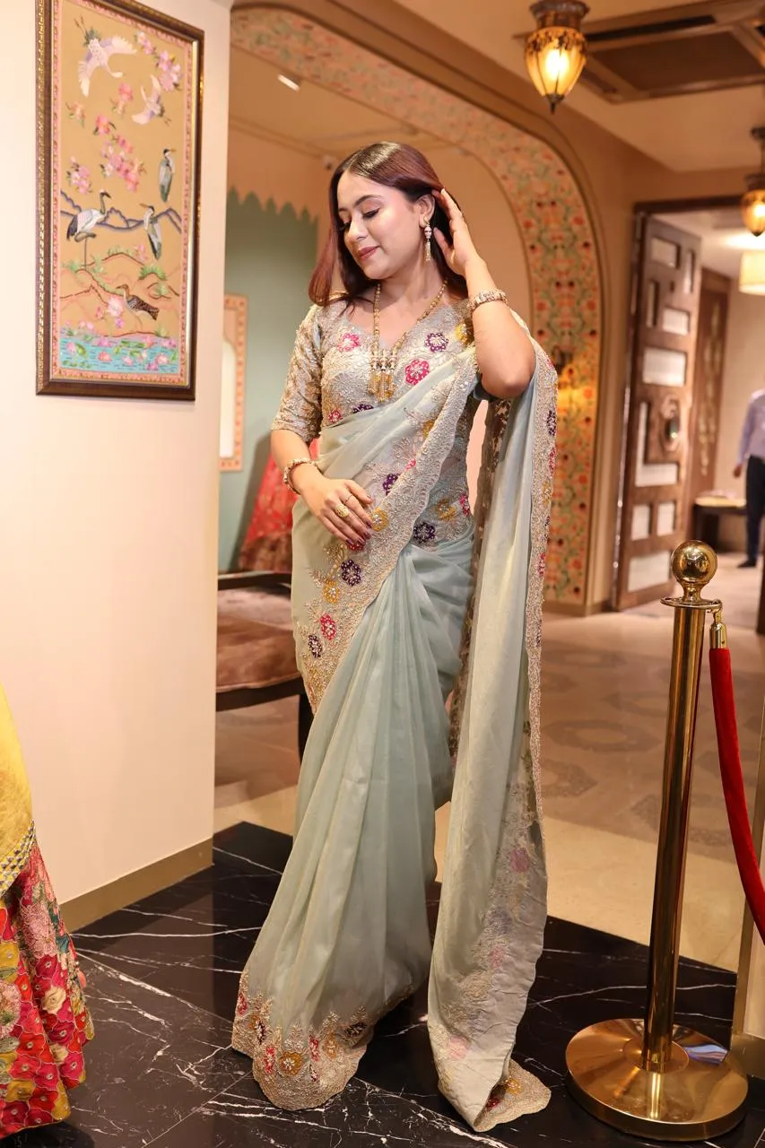 Pastel Green Embroidered Georgette Saree with Floral Blouse